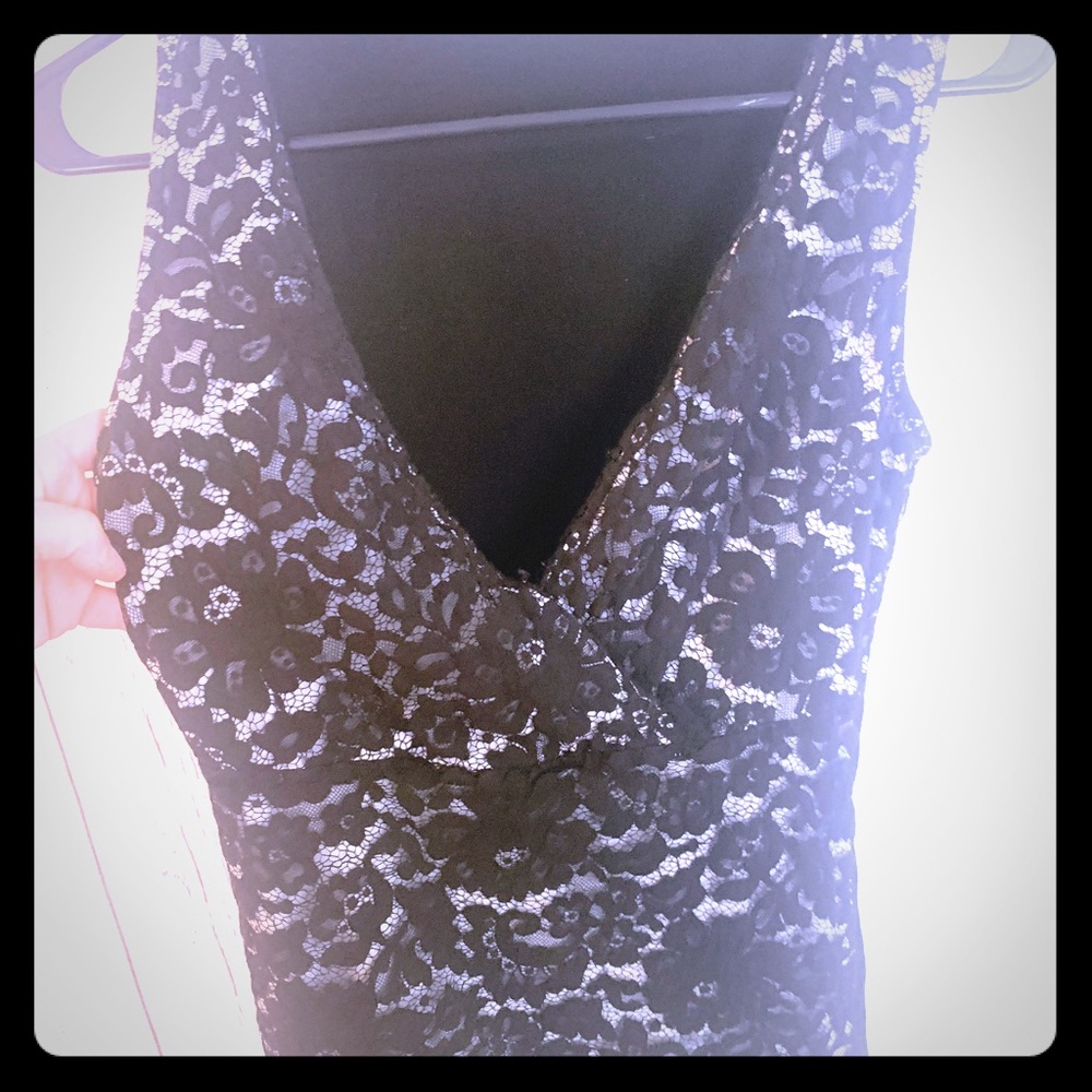 Boutique sleeveless lace going out top